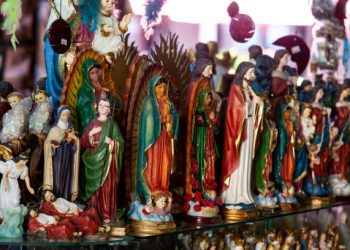 Buga, Colombia - October 2021.  Sale of religious articles close to the Minor Basilica of the Lord of Miracles located in the city of Buga in Colombia
