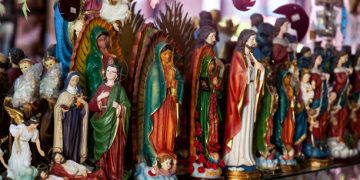 Buga, Colombia - October 2021.  Sale of religious articles close to the Minor Basilica of the Lord of Miracles located in the city of Buga in Colombia